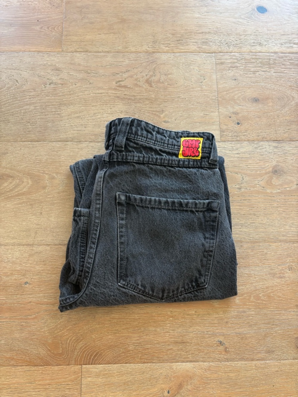 Empyre Black Relaxed Men's Jeans with Colorful Waist Patch